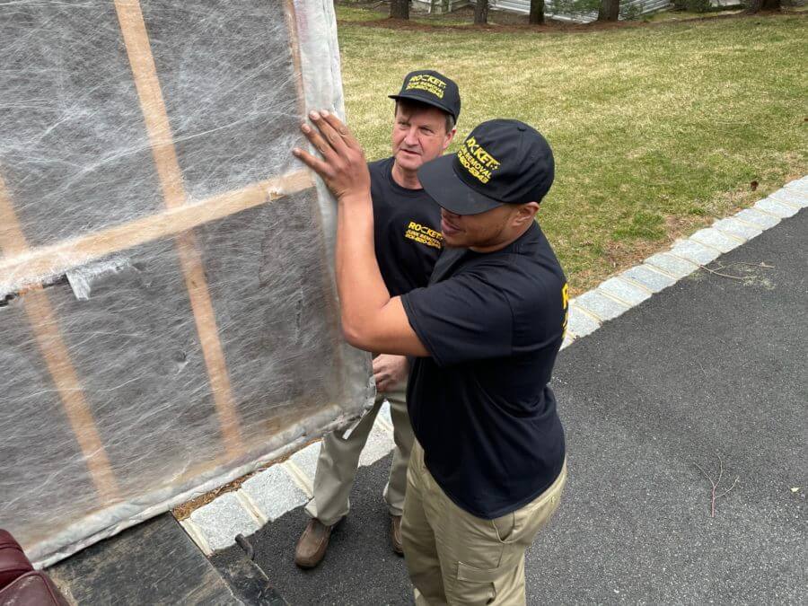 junk removal pros moving mattress